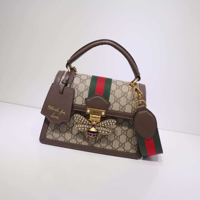 G*u*i top handle bags